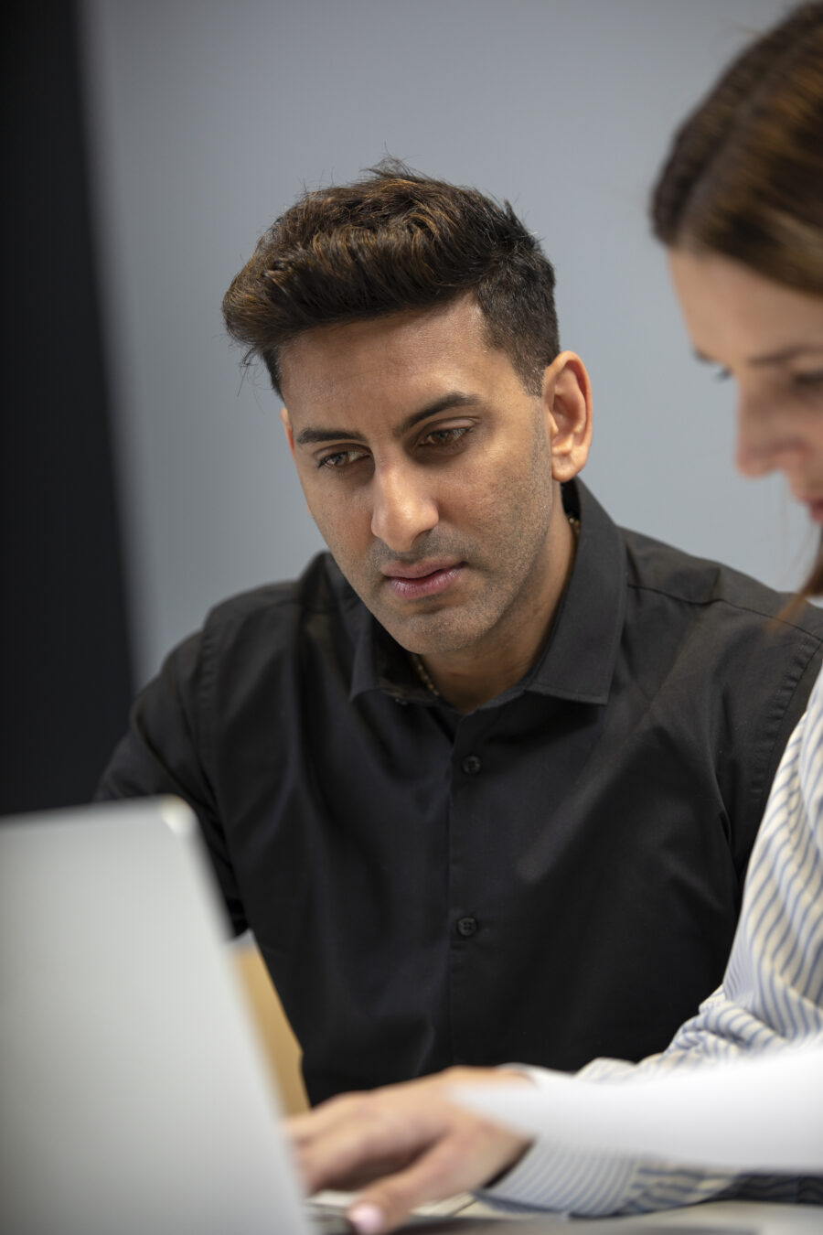 focussed-man-working-with-laptop